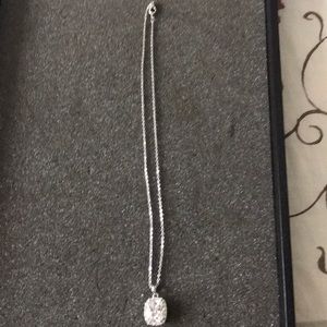 Silver tone and crystal necklace.